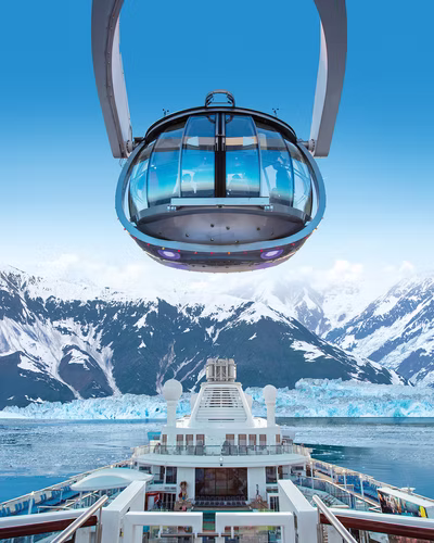 A glass viewing capsule above a glacier