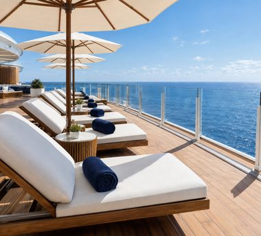 Sunbeds and parasols on a sun deck at sea