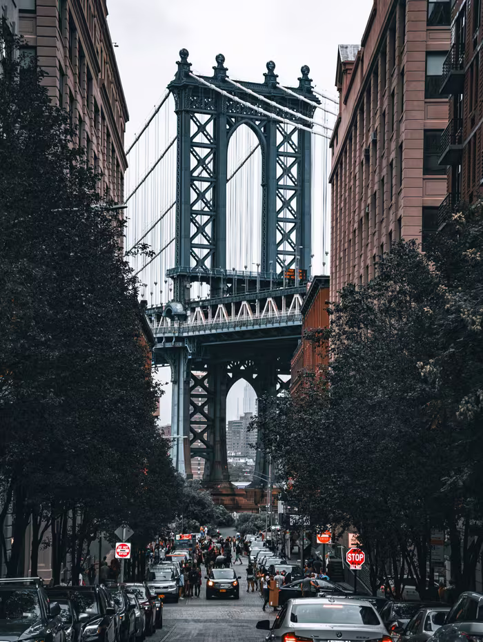 Manhattan Bridge framed by a Brooklyn street in DUMBO