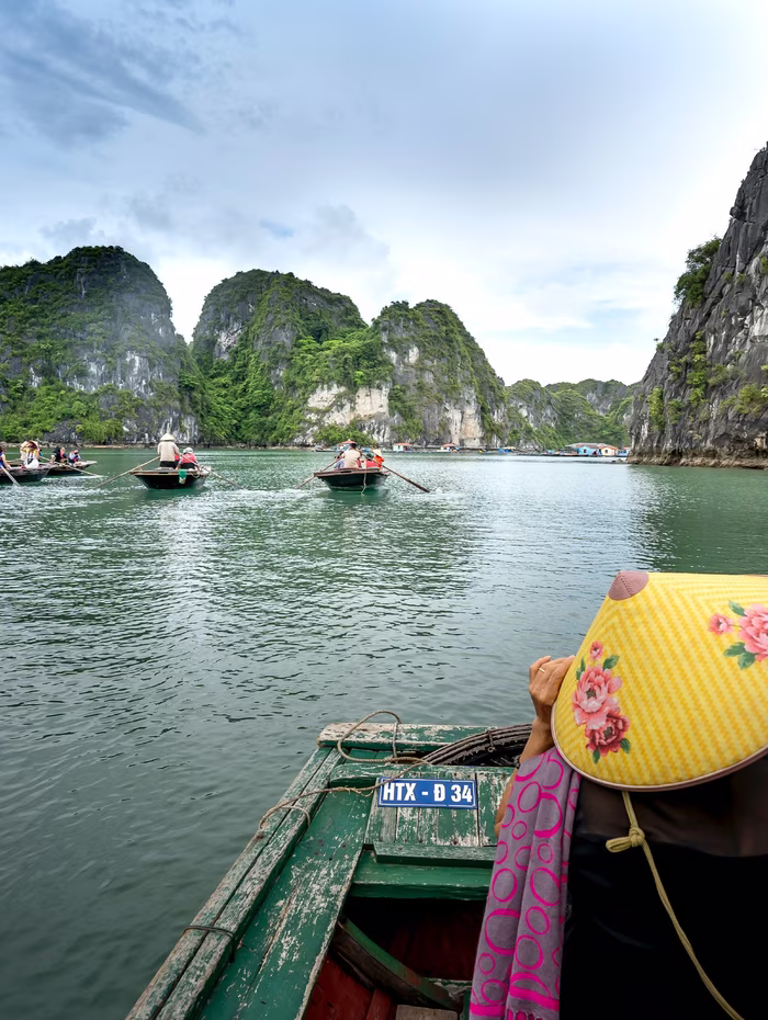 Limestone karsts rising from the water at Ha Long Bay
